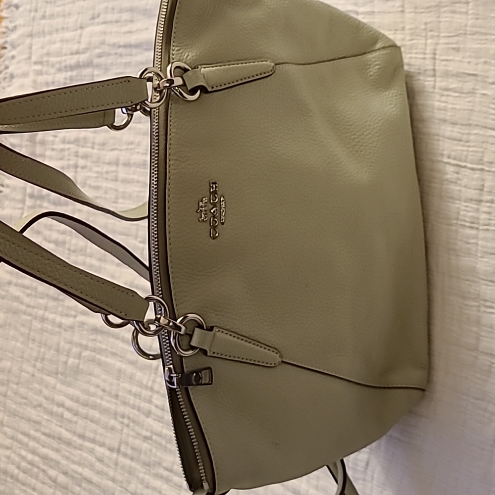 Coach purse creme with light green tone